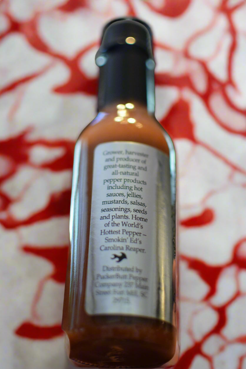 PUCKERBUTT PEPPER CO - REAPER SQUEEZINS HOT SAUCE