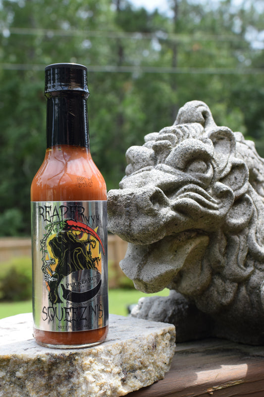 PUCKERBUTT PEPPER CO - REAPER SQUEEZINS HOT SAUCE
